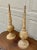 A striking pair of weathered cast iron garden finials with a beautifully aged surface and timeless architectural presence....
