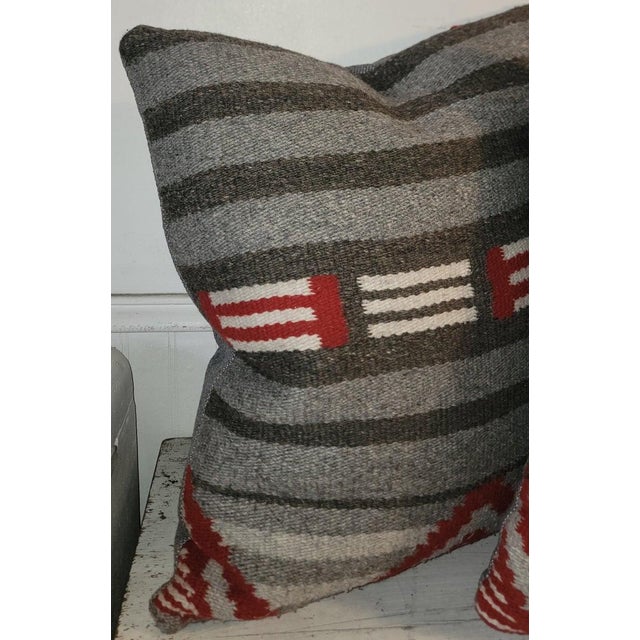 This pair of Navajo Indian weaving pillows are in great condition and have grey linen backings. The inserts are down &...
