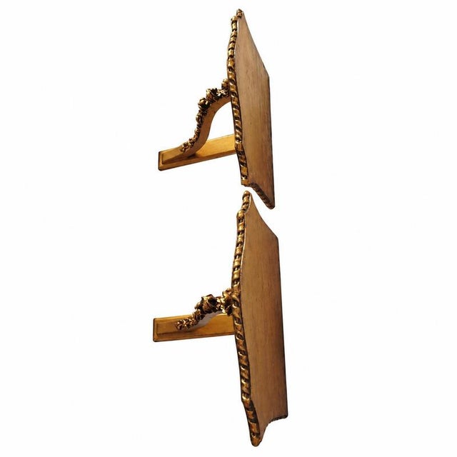 Pair of large gilded wooden wall corbels - Louis XVI style, late 19th century. Pair of carved and gilded wooden wall...