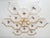 Italian midcentury flush mount with twelve clear Murano glass shades mounted on solid brass frame in lacquered polished...