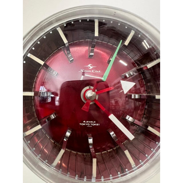 Tokyo Tokei clock, dating back to the 1960s, an iconic Space Age design object. Made of chromed ABS with a red dial,...