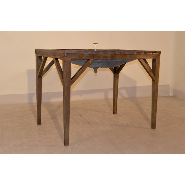 19th century unusual English dairy skimming table with zinc top and original brass drain plug. The table was used to skim...