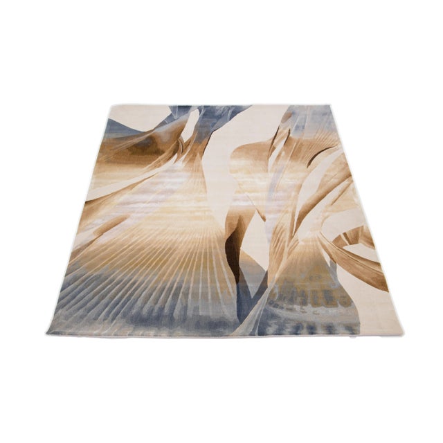 This hand-tufted abstract rug provides a captivating base for your interior design. Exhibiting a palette of elegant grey,...