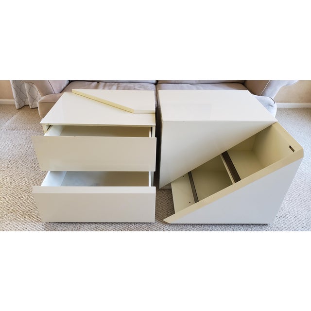 These gorgeous nightstands were produced in the 1980's and are an example of the stunning, ultra modern design by Rougier....