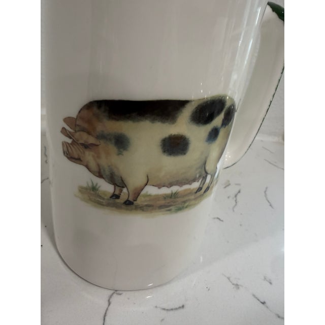 Vintage White Jug / Pitcher With a Pig on Both Sides With Green Trim From England This jug / pitcher was made in Sheffield...