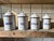 Mid-Century Modern Enameled Sheet Metal Spice Jars, 1940s, Set of 6 For Sale - Image 3 of 10