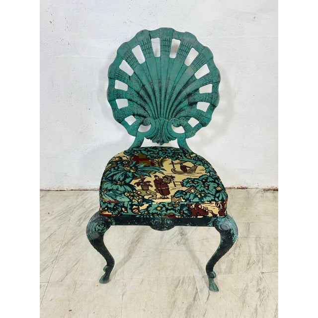 This piece is a Brown Jordan shell-back side chair, a mid-century design classic known for its sculptural and coastal-...