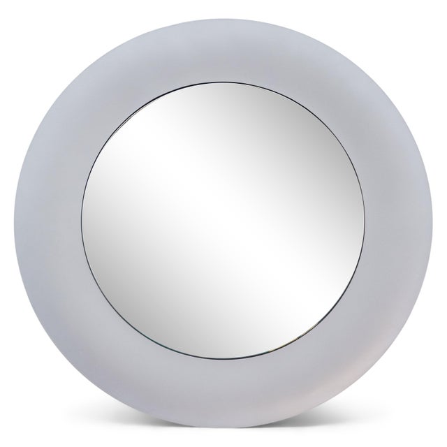 Pair of sculptural modernist mirrors by artist Lorenzo Burchiellaro. Textured cast aluminum with a slightly concave shape....