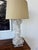 Stylish and very solid pair of table lamps composed of towering clear quartz/rock crystal. A square lucite base and drum...