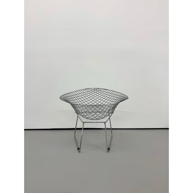 A classic mid-century modern lounge chair after Russell Woodard, featuring the iconic Sculptura form with a sculpted,...