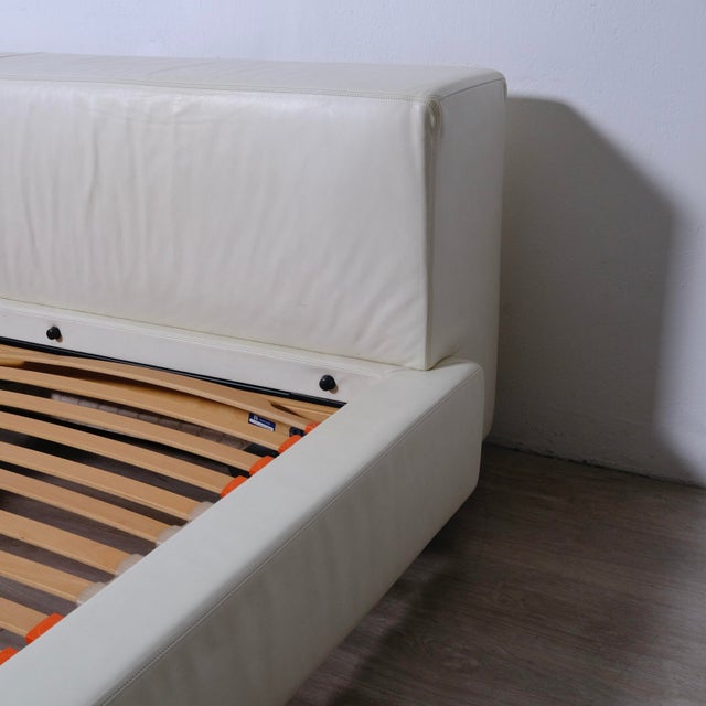 The Sera double bed, a high-end double bed produced by Poltrona Frau and designed by Roberto Palomba, features a padded...