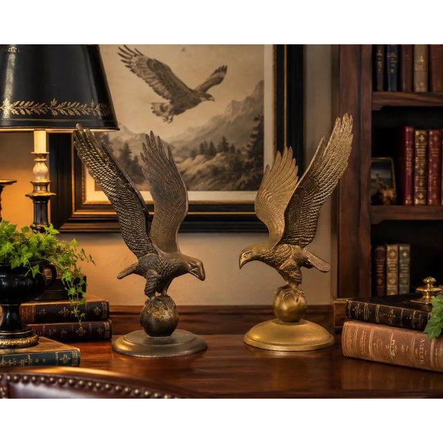 Bring timeless Americana style to your home with this striking pair of vintage cast metal eagle sculptures, crafted in...