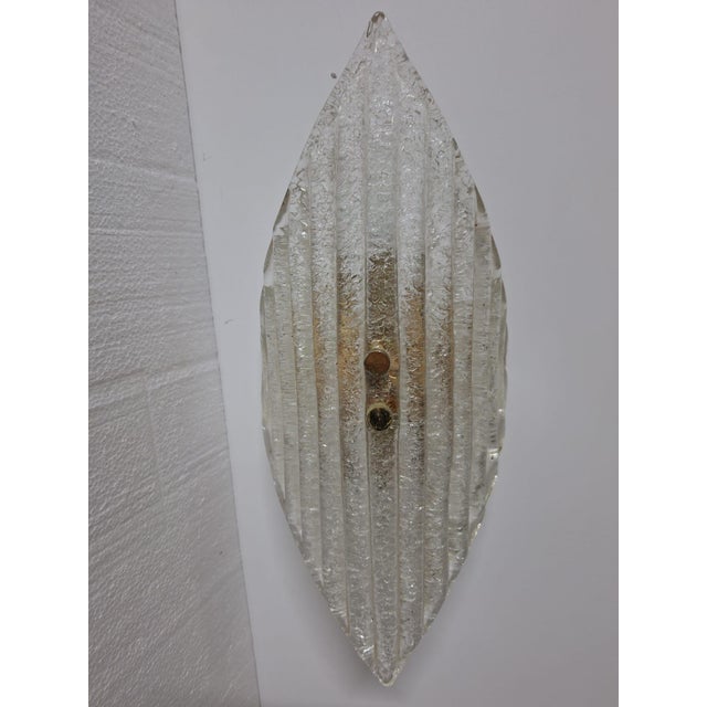 An extremely rare set of three original Mid-Century Modern wall lamps, entirely handcrafted by master glassmakers in...