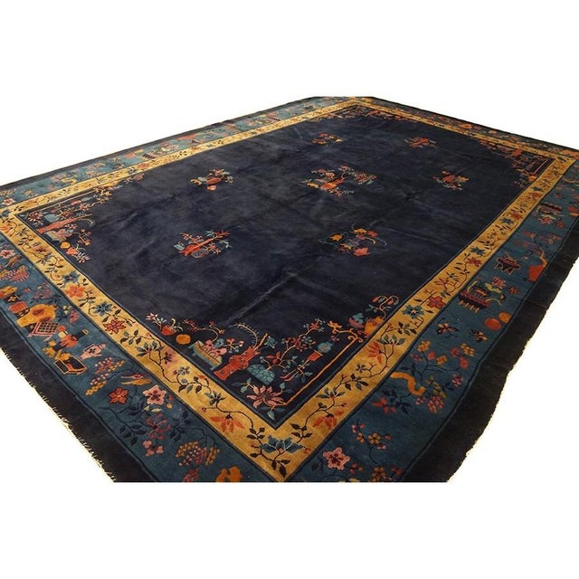 Antique Wool - Manchester Blue Hand Knotted Pile Rug, Circa Date: 1920s. This striking example of Chinese Art Deco weaving...