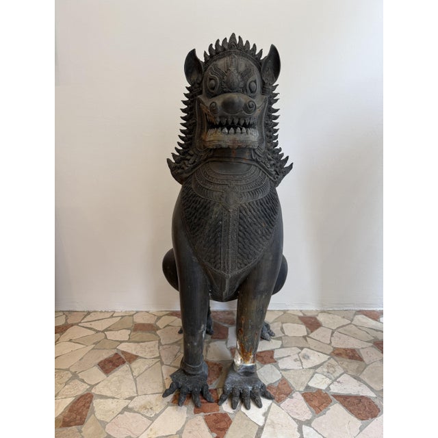A pair of 19th-century bronze guardian lions from Thailand. These majestic lions, called Singha, are mythological...