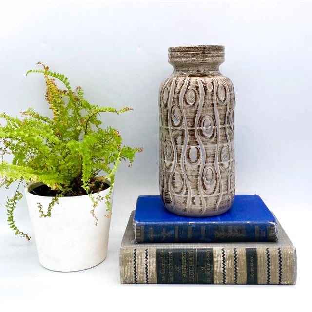 Beautiful, mid-century modern vase made in West Germany. Lovely contemporary design and neutral earth tones make this a...