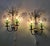 The wall lights are made of metal and mouth-blown Murano glass. The green glass elements for the candle holders are also...