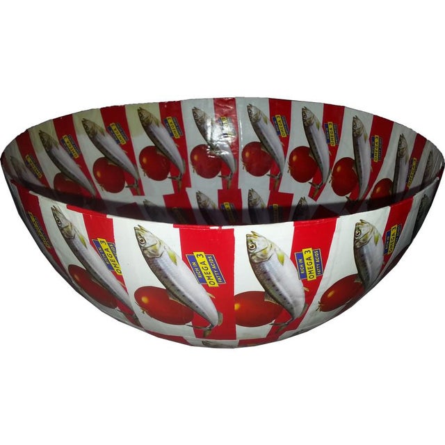 This round bowl was crafted from paper in Africa.