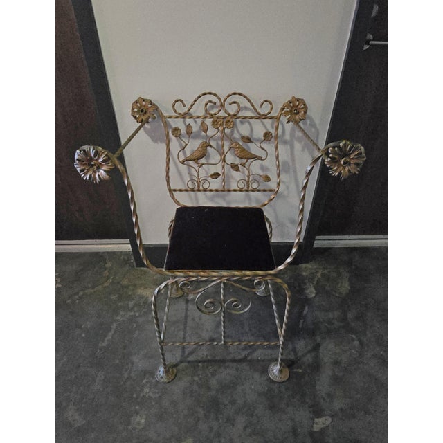 1920.s Italian Wrought Iron Savarola Chair With Birds sold as found showing normal signs of use missing two leaves from back.