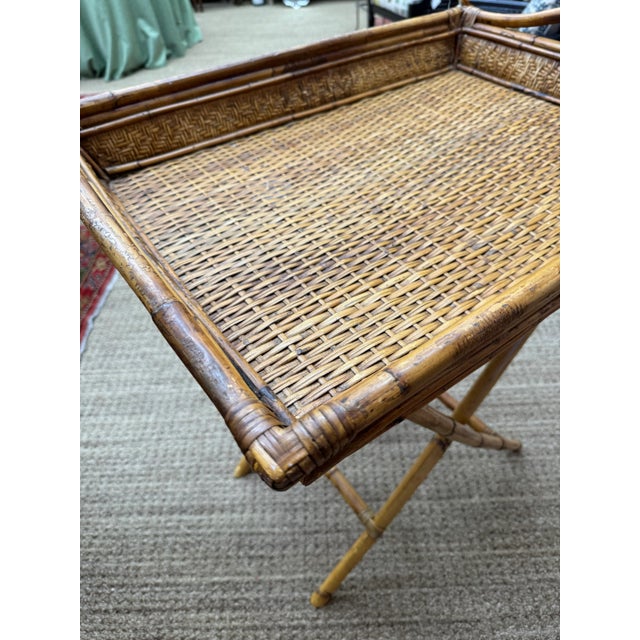 This vintage bamboo folding tray table has maximum versatility. It would make a perfect bar or practical side table. The...