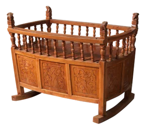 Rocking Cradle in Carved Wood