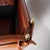 Rare vintage leather sofa known as a "Knole" sofa. with its gilt brass tassels and retractable sides, this two-and-a-half-...