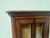 Small wall-mounted display cabinet with two natural wood doors Two glass doors on the front Good condition Dimensions: H...