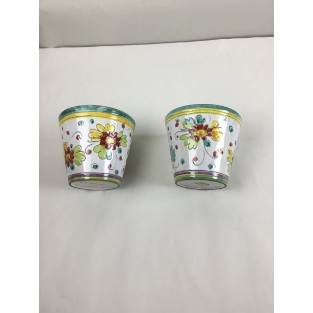 Pair of hand painted majolica planters from Italy.