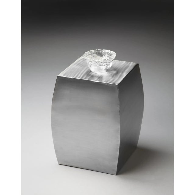 Its impeccably elliptical sides and shimmering stainless steel finish guarantee this accent table will stand out as...