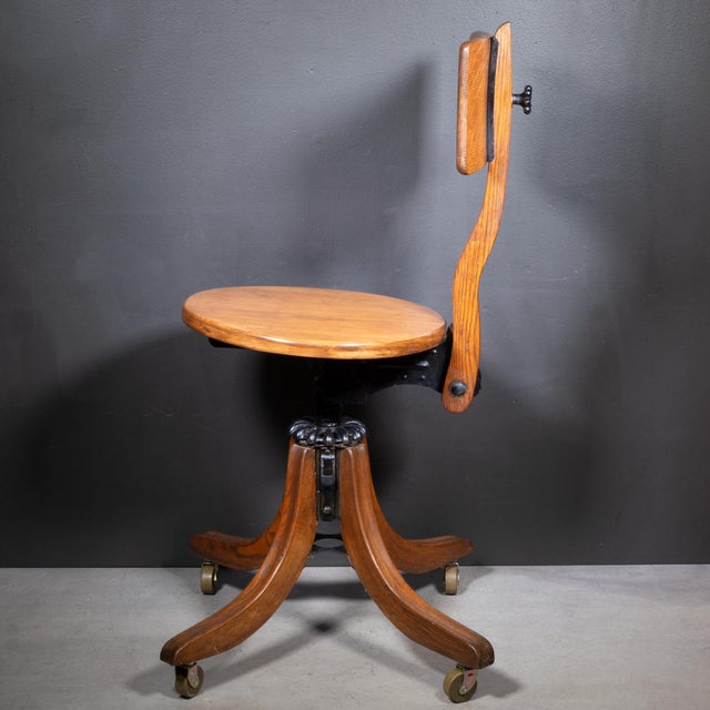 ABOUT Antique solid oak, fully adjustable, swivel stenographer's or typist's chair with cast iron mechanisms. Adjust the...