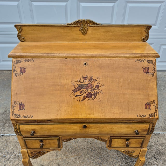 This is a lovely petite secretary desk from the Victorian era. It is made of solid oak with beautiful carved accents with...