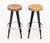 Pair of After Jean Prouve Circular Oak Seat Bar Stools, on black patinated metal and aluminum bases. 28.25" H x 14.5"...
