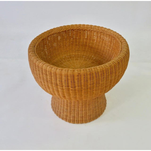 Eero Aarnio wicker table base calls for glass insert 21.63 " not included with this base .