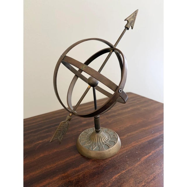 A beautifully crafted iron armillary sphere, evoking the timeless elegance of classical European gardens. Pieces like this...