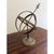 A beautifully crafted iron armillary sphere, evoking the timeless elegance of classical European gardens. Pieces like this...