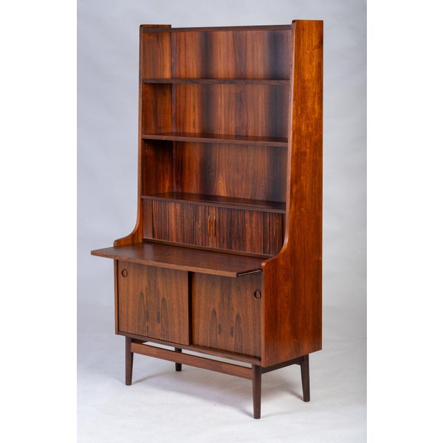 This practical piece of furniture is manufactured by Nexø in Denmark in 1964. It has very beautiful drawings in the wood...