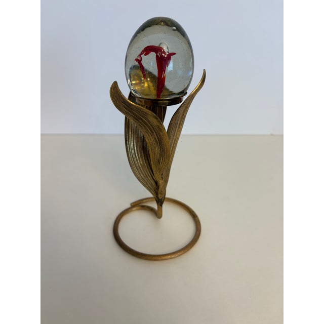 The art nouveau brass leaves hold a 1960's Murano style lily bud vintage vessel. I found this quite extraordinary...