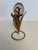 The art nouveau brass leaves hold a 1960's Murano style lily bud vintage vessel. I found this quite extraordinary...