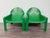 A pair of iconic Model 4794 armchairs, designed by renowned Italian designer Gae Aulenti for Kartell in 1974. This...
