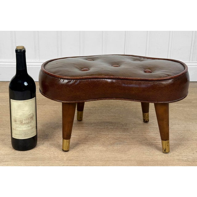 Original 1950's Kidney Footstool Attractive Brown Button Tuft Vinyl Solid Wood Tapered Legs with Gold Foot Caps Quaint...