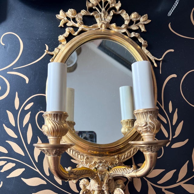 This is a lovely vintage two-arm sconce that is in beautiful vintage condition. Made for Baker, Knapp and Tubbs, this is a...