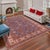 Enhance your home with this exquisite hand-knotted Super Kazak rug, crafted from fine hand-spun wool and dyed with all-...