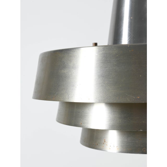Hans-Agne Jakobsson Aluminum Pendant for AB Markaryd, Sweden, c. 1960s A sculptural Swedish pendant designed by Hans-Agne...