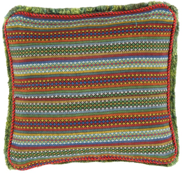 This Gabbeh pillow is made of high-quality LAMBS WOOL The piece was crafted with good workmanship. Gabbeh rugs are made by...