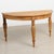 Pair of 19th century Swedish demilune console tables, crafted in pine with bold turned legs and simple skirts measuring...