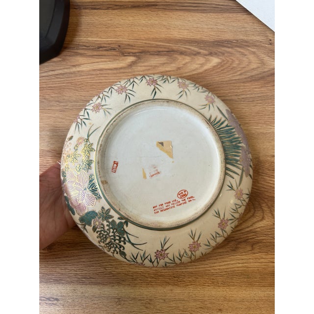 Up for consideration is a beautiful vintage pair of pink and teal floral Asian plates with gold accents. These would look...