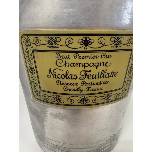 An authentic vintage French champagne bucket from Nicolas Feuillatte, one of Champagne's most celebrated houses, produced...