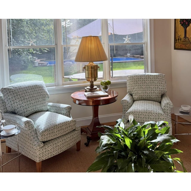 A Pair of Howard & Sons Clayton Lounge Chairs with Custom Slipcovers An iconic pair of Clayton Lounge Chairs by Howard...