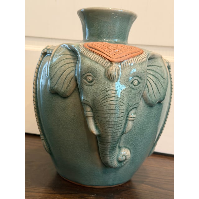 Authentic green CELEDON decorative vase in elephant style from Thailand 11” tall, 12” long, 9” wide. Vase opening is 3” in...