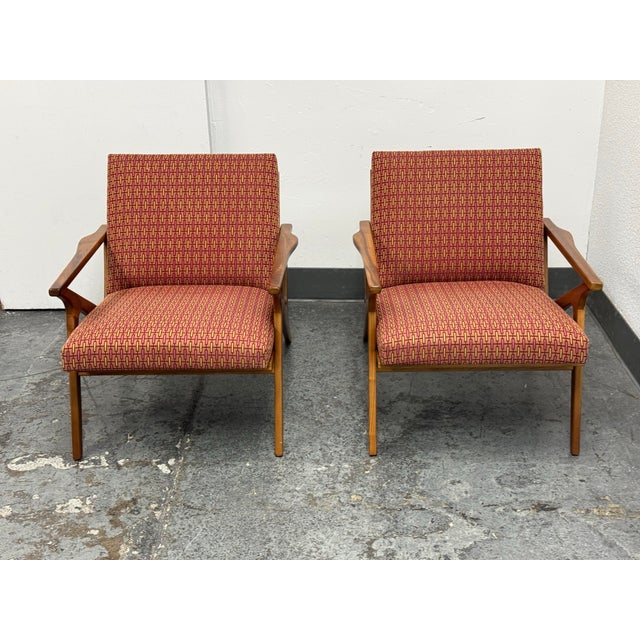Design Plus Gallery presents a Pair of Covett Armchairs from Crate & Barrel. These mid-century inspired armchairs showcase...